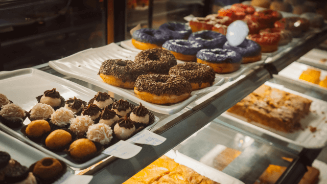 Heat exchanger integrity test for a sweetening formula producer - A selection of sweet pastry displayed in a bakery